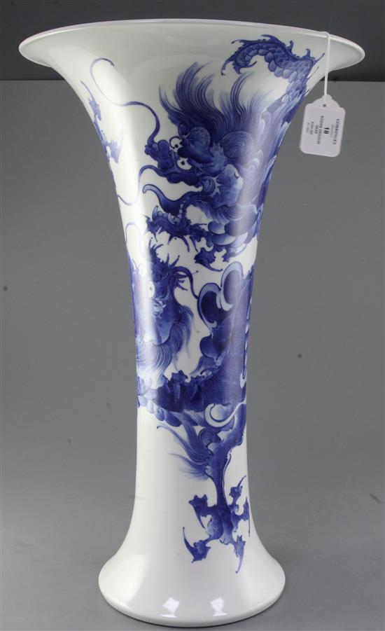 A large Japanese blue and white trumpet shaped vase, by Makuzu Kozan II (Miyagawa Hanzan, 1858-1940), 59.5cm, two hairline rim cracks